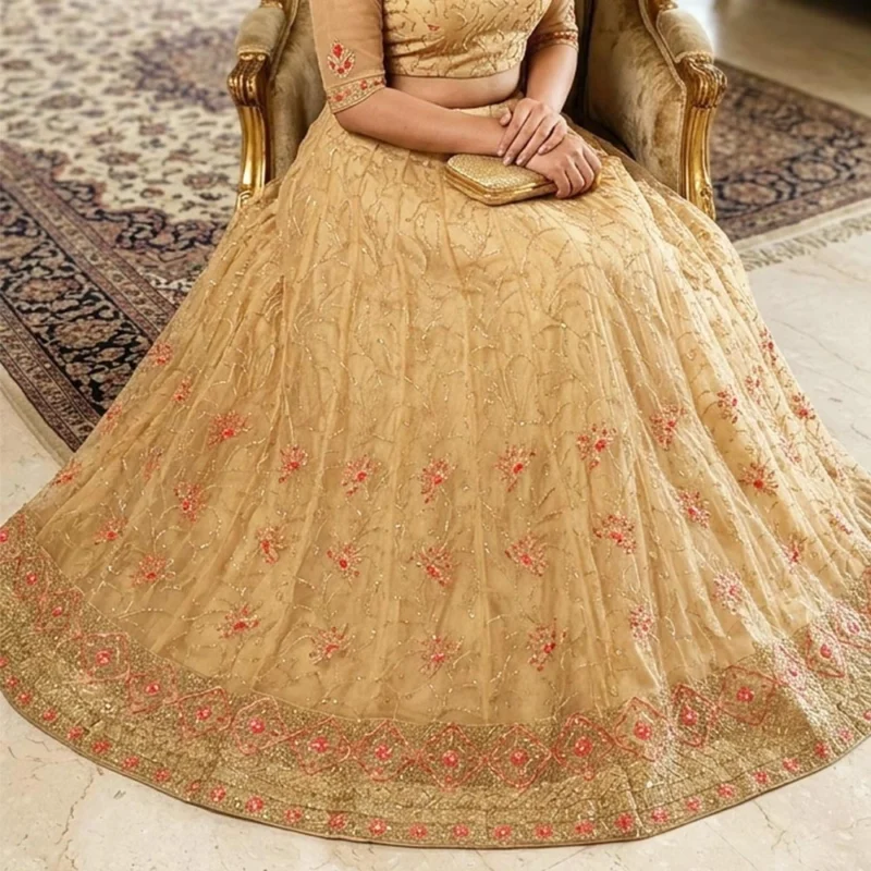 Elegant beige net embroidered lehenga choli with floral zari